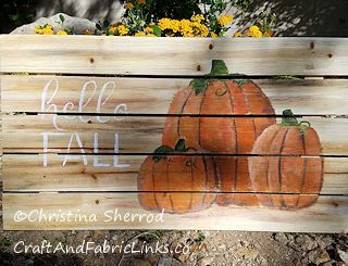 pumpkins painted on wood palette