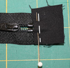 stitch zipper end piece