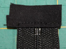 trimmed zipper end