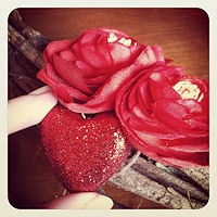 add decorations to heart wreath