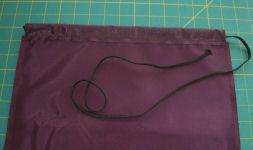 cord at top of bag