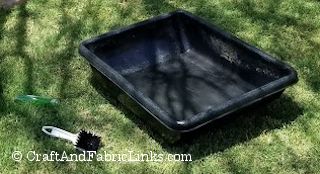 clean a black rubber tub for a diy bird bath