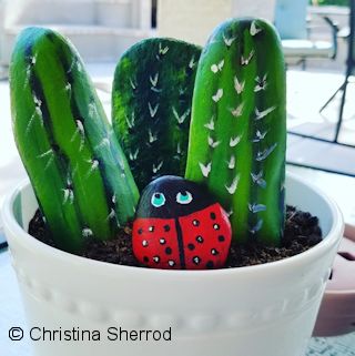 rock painting cactus and ladybug